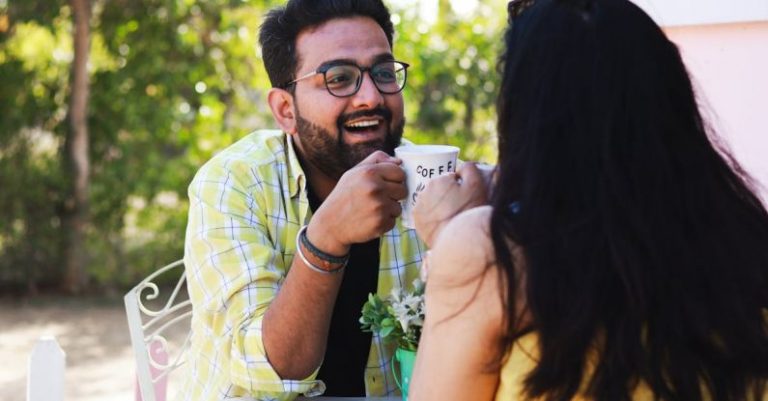 Coffee Date - Man and Woman Sitting on Chair