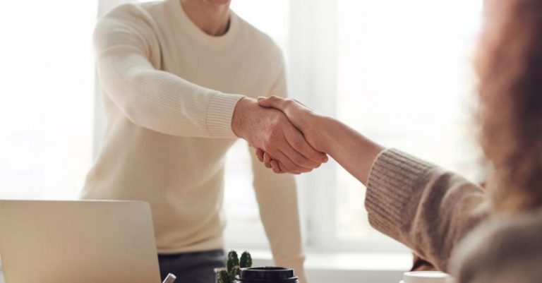 Job Interview - Man and Woman Near Table